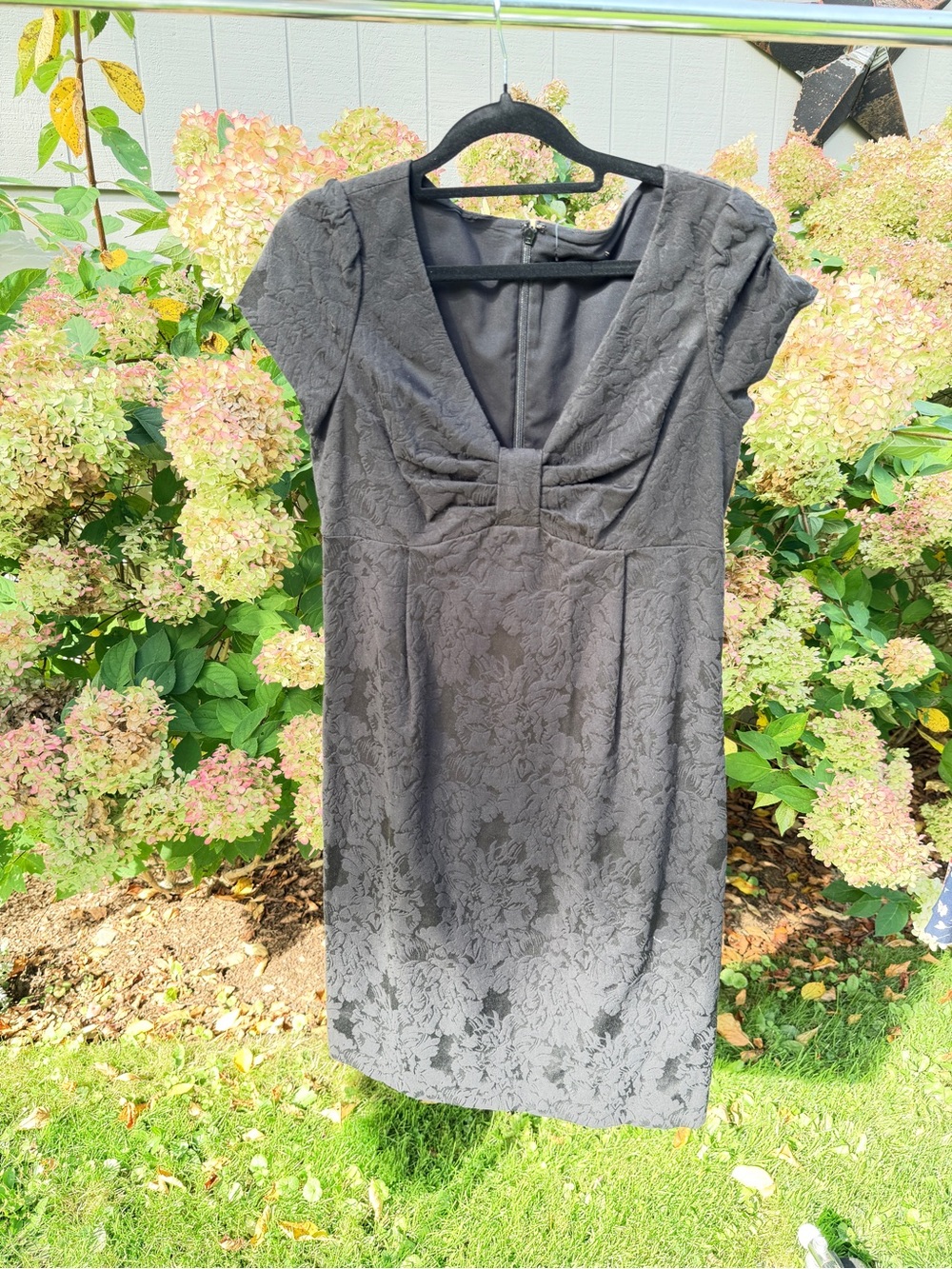 Elegant Black Lace-Texture Cap Sleeve Dress with V-Neck